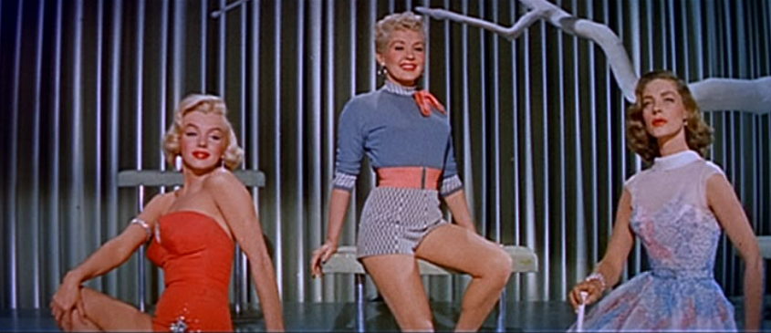 Monroe with Betty Grable and Lauren Bacall in the film How to Marry a Millionaire (1953)
