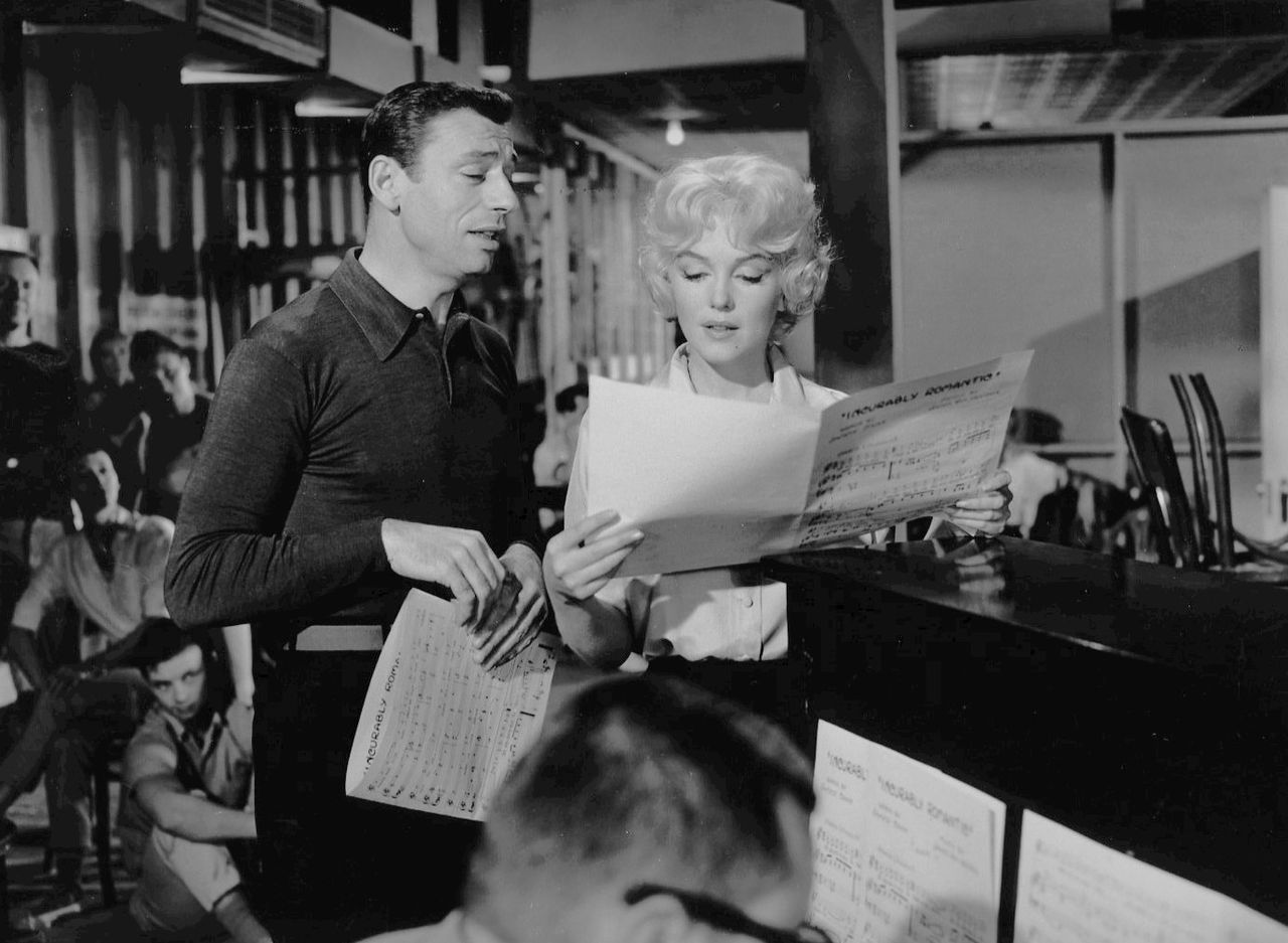 Monroe with Yves Montand in Let's Make Love (1960), which she agreed to make only to fulfill her contract with Fox