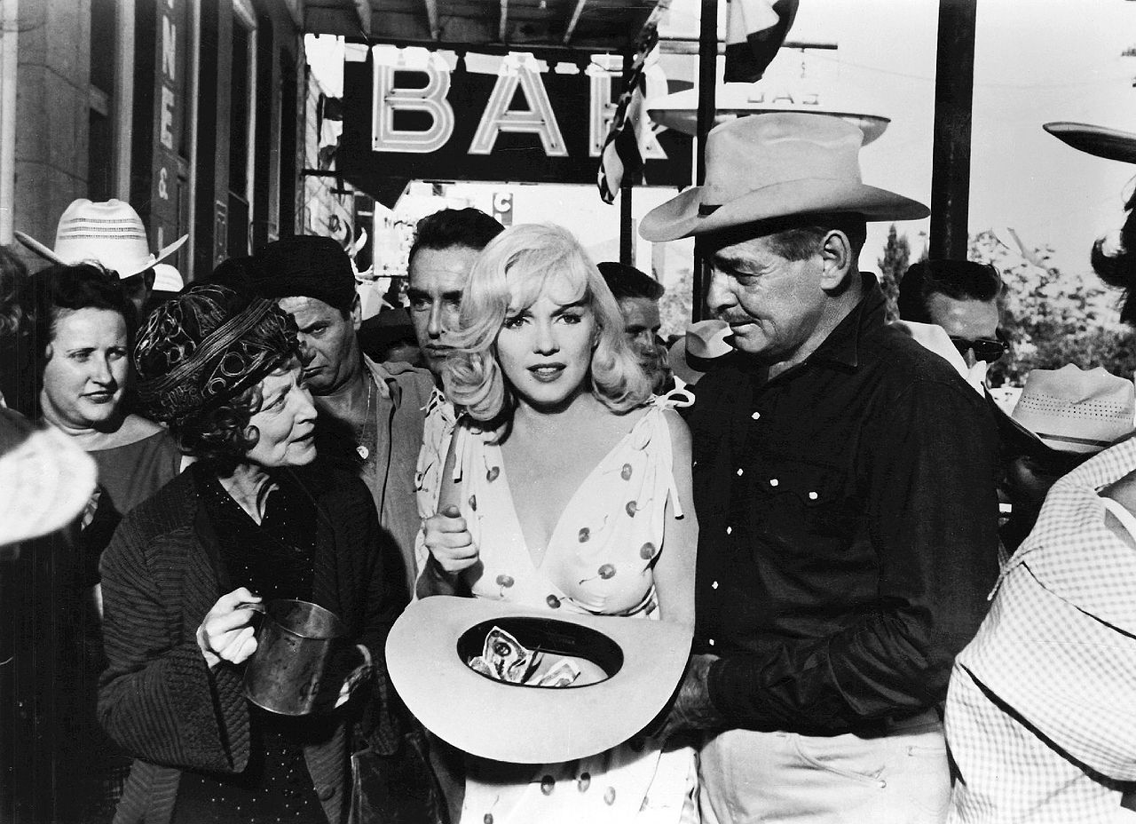 Monroe, Estelle Winwood, Eli Wallach, Montgomery Clift, and Clark Gable in The Misfits (1961). The Misfits was the final completed film for Monroe and Gable, who both died within two years.