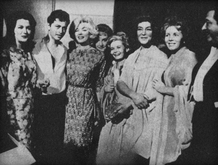 Monroe (third from left) with actors on the filming set of The Exterminating Angel during her visit to Mexico in February 1962, one of her last media appearances